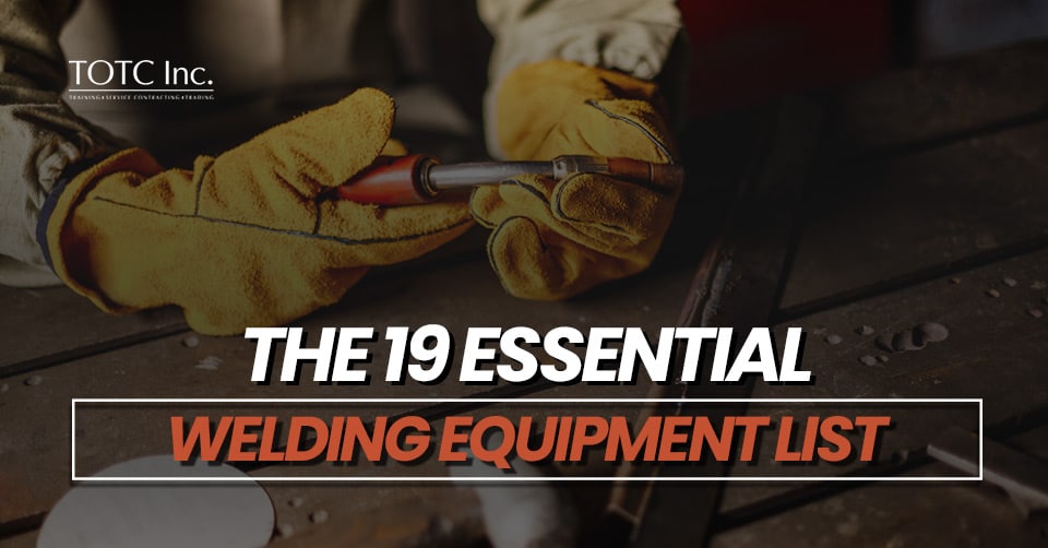 welder holding welding equipment